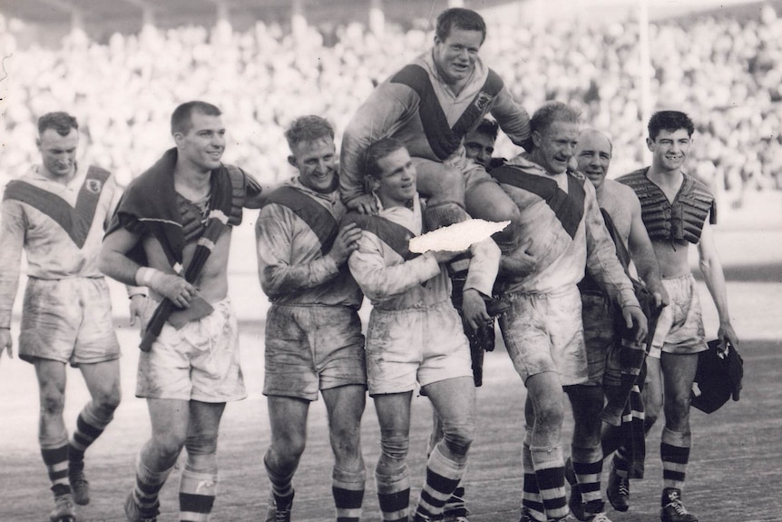 St George captain-coach Ken Kearney is chaired off after the 1960 grand final.