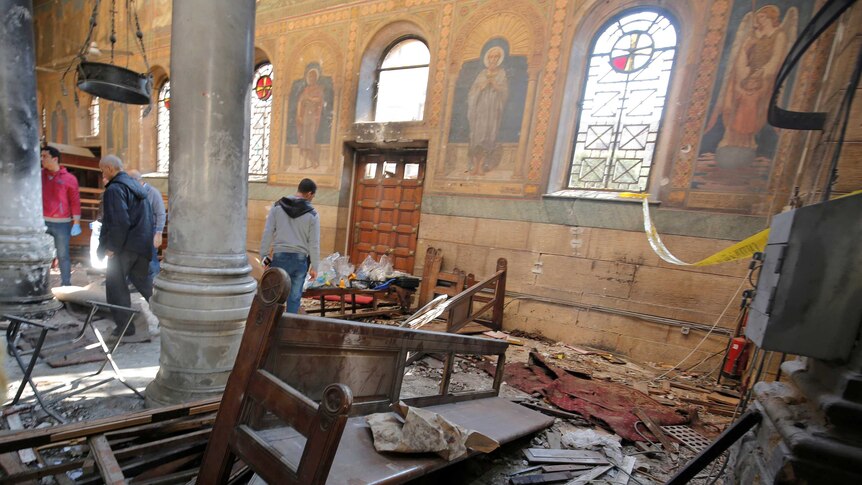 Debris cover the floor of a church in Cairo