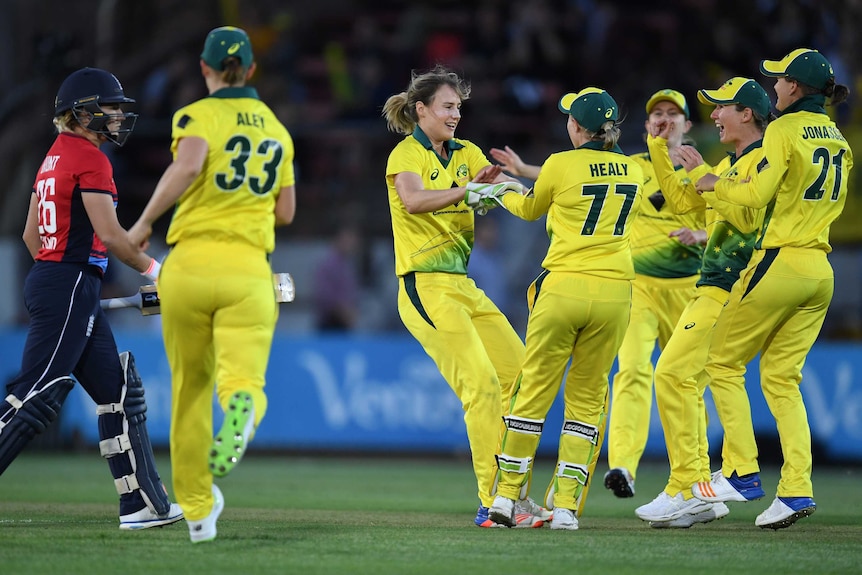 Australia celebrates a wicket against England