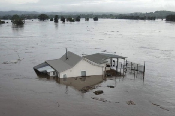 A house surrounded by water