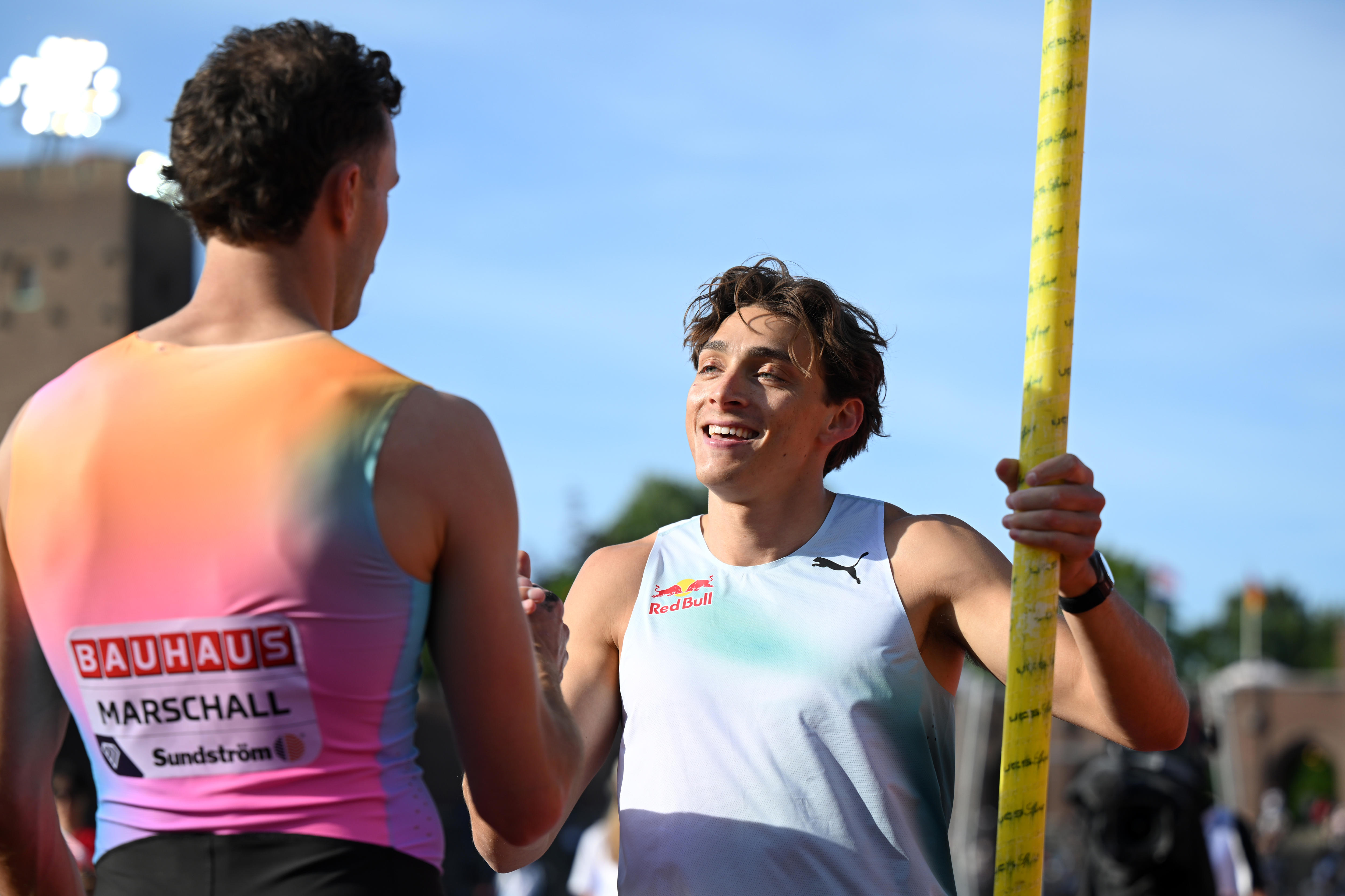 Armand Duplantis interacts with Kurtis Marschall at the Stockholm Diamond League meet.