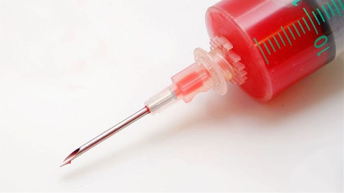 A syringe with blood