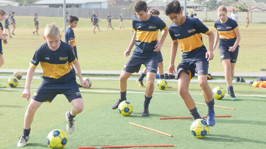 Students taking part in a high-performance pilot program with Westfields Sports High in NSW perform training drills.
