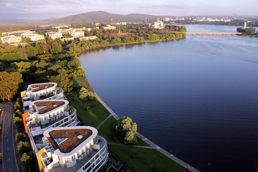 View of lake Burley Griffin from a hot air balloon from above Kingston Foreshore. Kings Avenue Bridge in top right hand corner