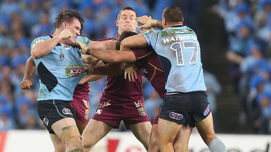 New South Wales captain Paul Gallen punches Queensland's Nate Myles during Origin I.