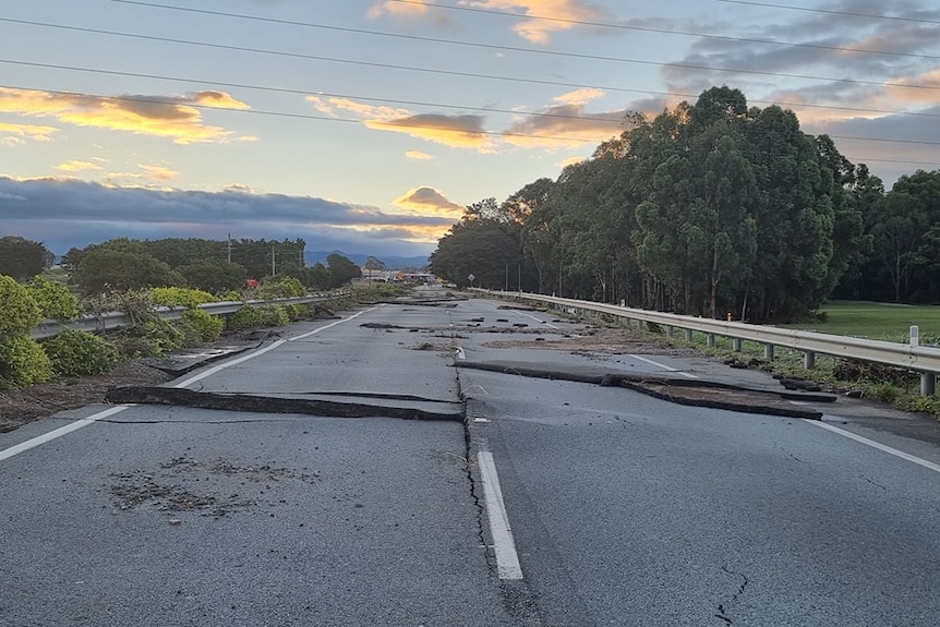 Flood damage to damage to Gympie Road between Bald Hills and Strathpine in Brisbane