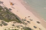 Rescue helicopter on Wedge Island beach following fatal shark attack
