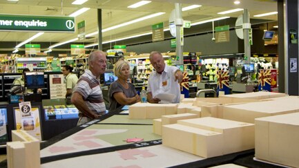 Anti-high rise campaigners protesting a proposed planning amendment display a cardboard model in a Fremantle shopping centre
