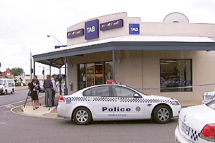 Police cars at TAB robbery scene