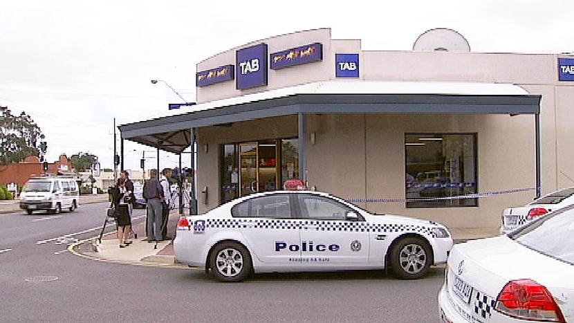 Police cars at TAB robbery scene