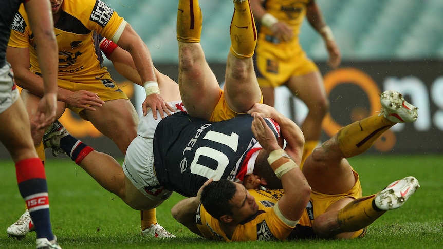 The Roosters' Martin Kennedy dumped in a heavy tackle