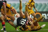 The Roosters' Martin Kennedy dumped in a heavy tackle
