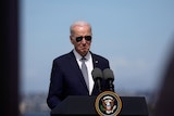 Joe Biden wears his aviator sunglasses.