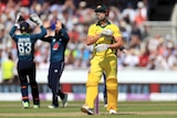 Australia's Aaron Finch leaves the field after being dismissed