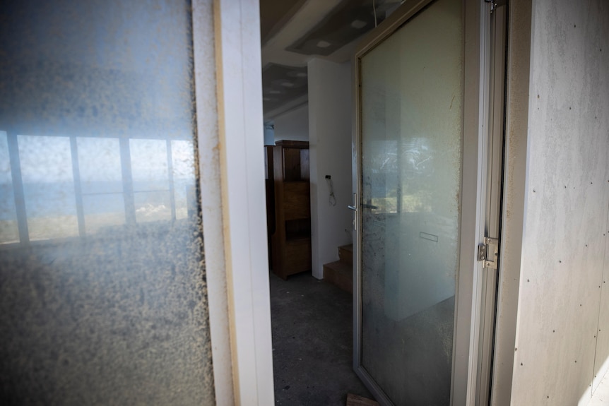 Dust covered front entrance of Kevin Haley and Sonia Gardner's home.