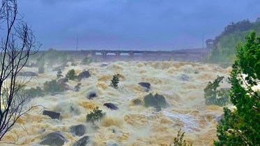 Torrents of water pouring out of a dam
