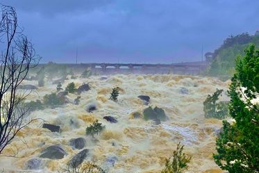 Torrents of water pouring out of a dam