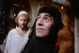A still from the movie Monty Python's Life of Brian of Terry Jones dressed as a woman.