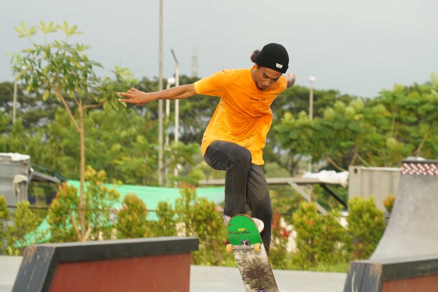 Skateboarder Pevi Permana does a trick at a skatepark in Jakarta.