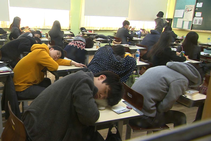 Students in South Korea sleep during class