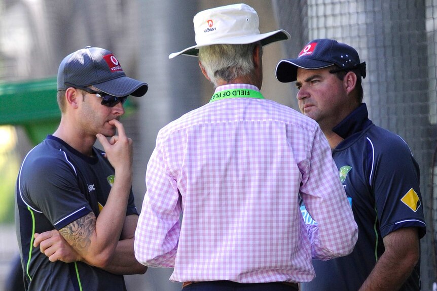 Michael Clarke (left) speaking with coach Mickey Arthur and chief-of-selectors John Inverarity yesterday.