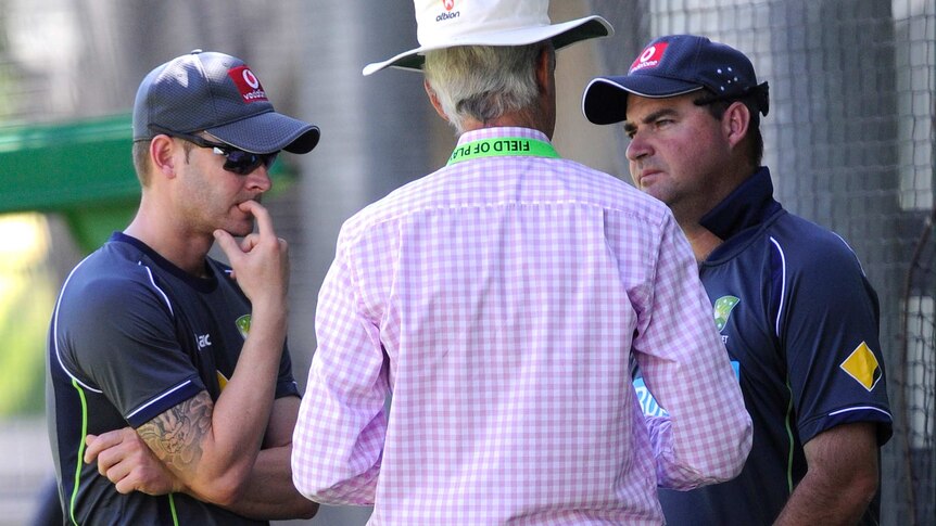 Injury fears ... (LtoR) Michael Clarke speaks with John Inverarity and coach Mickey Arthur at the MCG.