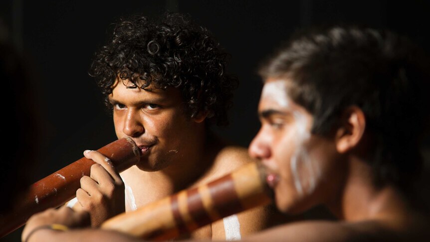 Bremer State High School students play the didgeridoo during a performance at the school, west of Ipswich.