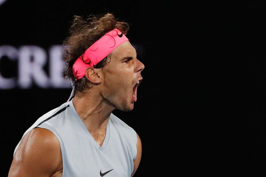 Spain's Rafael Nadal celebrates winning the third set against Marin Cilic at the Australian Open.