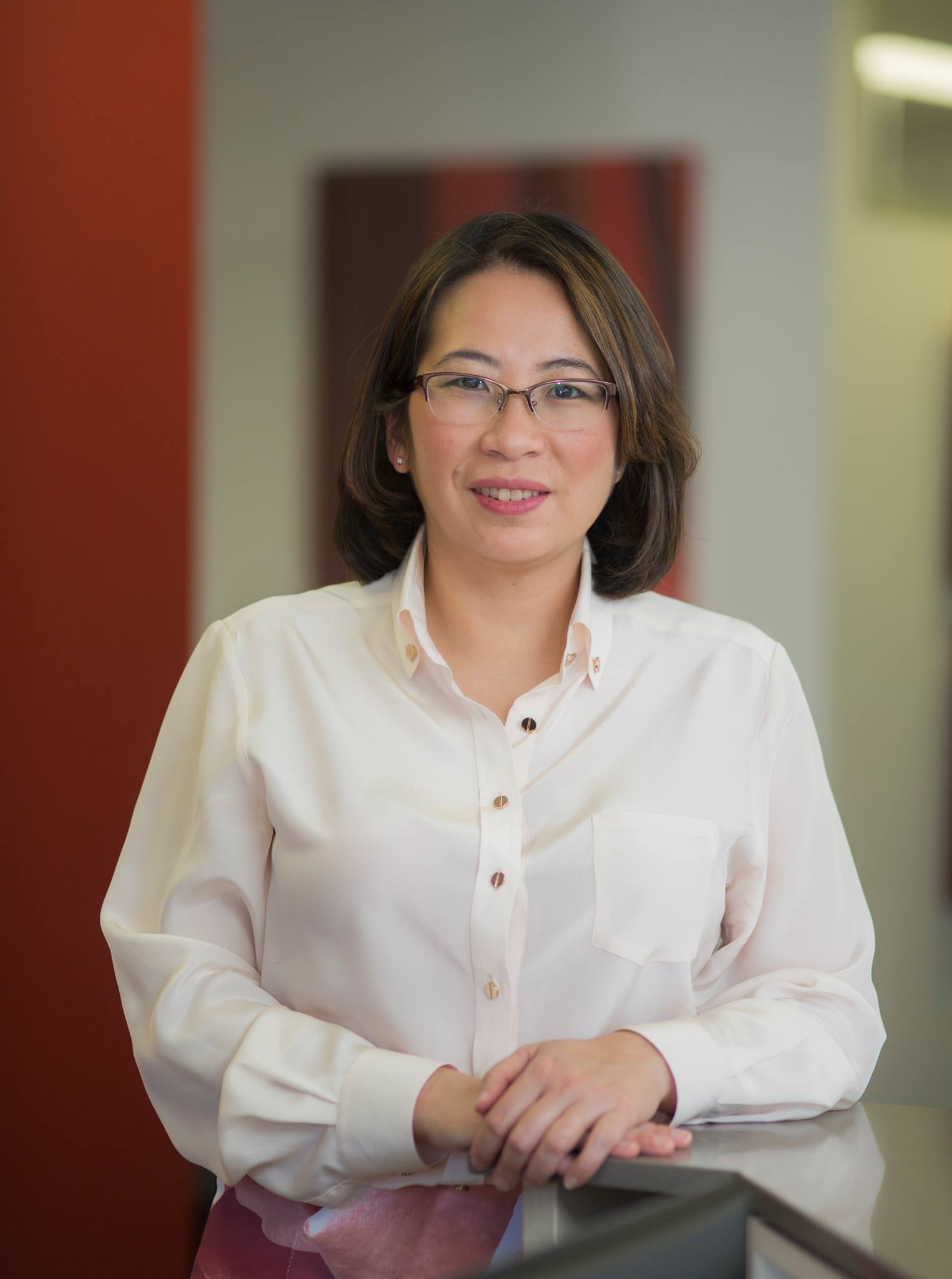A woman in white shirt. 