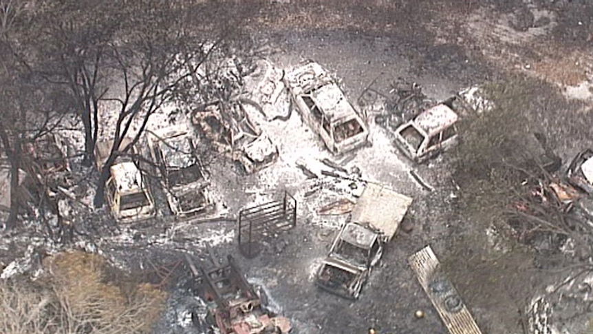 Burnt out cars from bushfires at Deepwater and Baffle Creek.