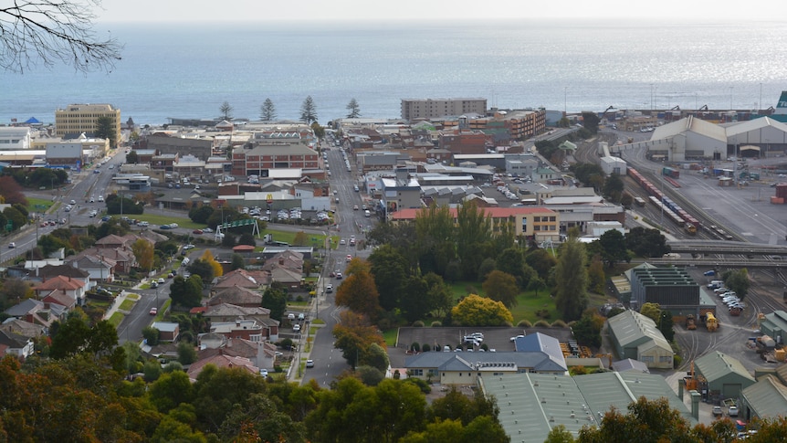 A view of seaside town from a hill 