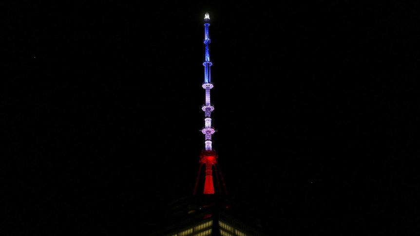 One World Trade Centre lit up in blue, white and red