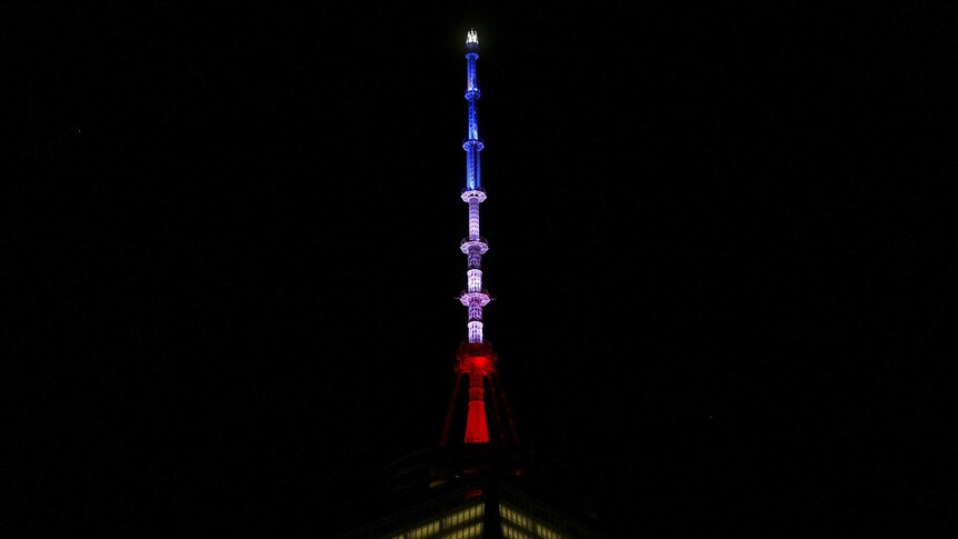 One World Trade Centre lit up in blue, white and red