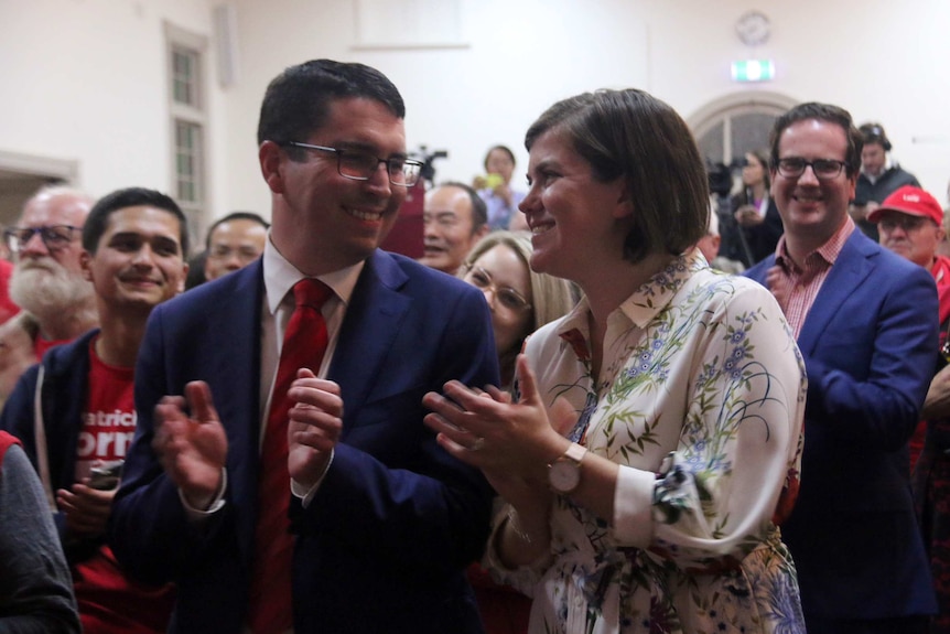 Patrick Gorman and his wife Jess smiling at each other at Labor's victory party.