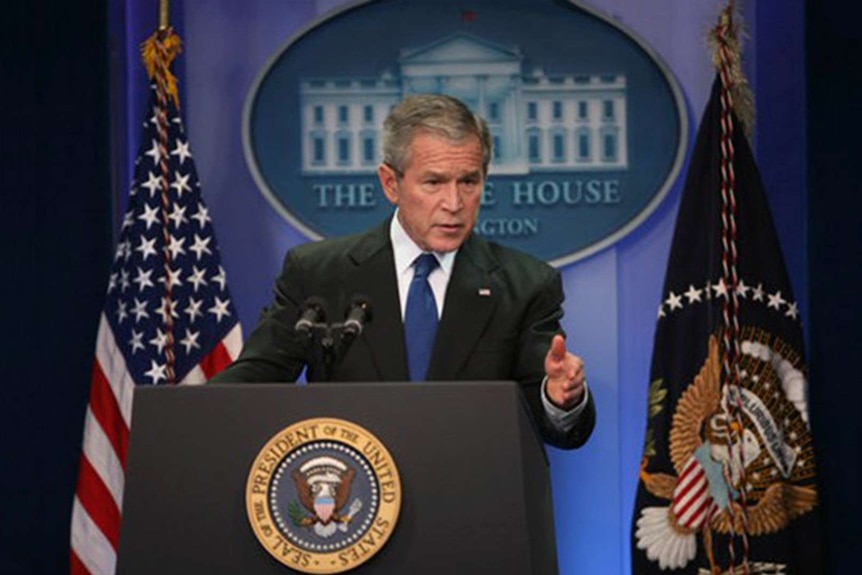 US President George Bush speaks from a White House lectern