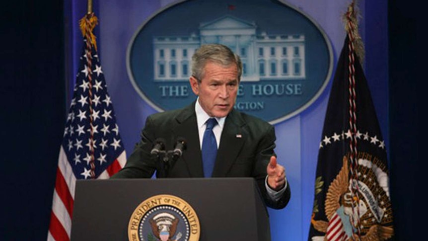 US President George Bush speaks from a White House lectern