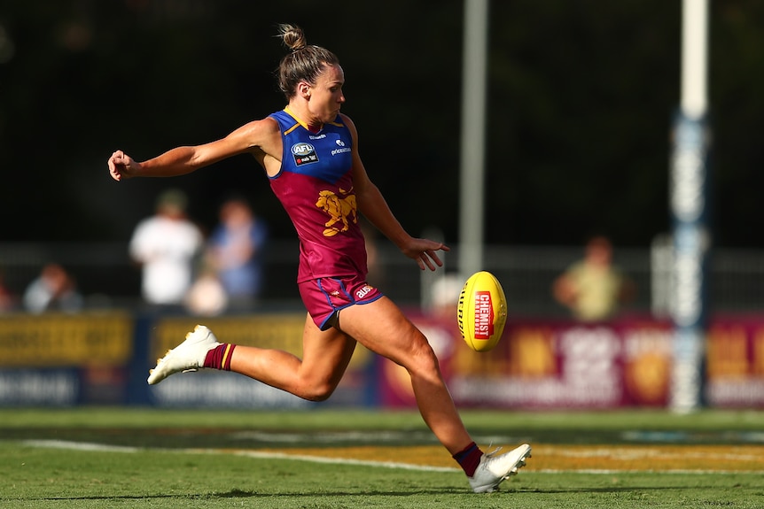 Emily Bates kicks the ball during the Brisbane Lions' round four AFLW clash with Geelong