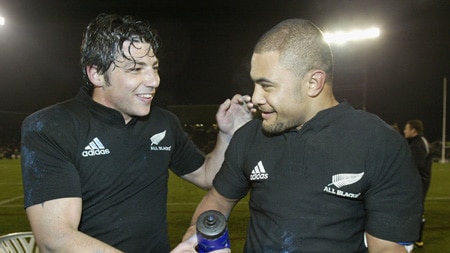 Byron Kelleher #20 (l) and Sam Tuitupou (r) celebrate after New Zealand beats South Africa