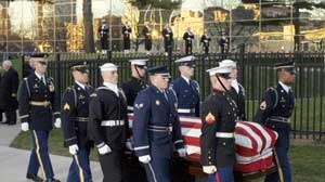 The coffin of former US president Gerald Ford being carried at his funeral.