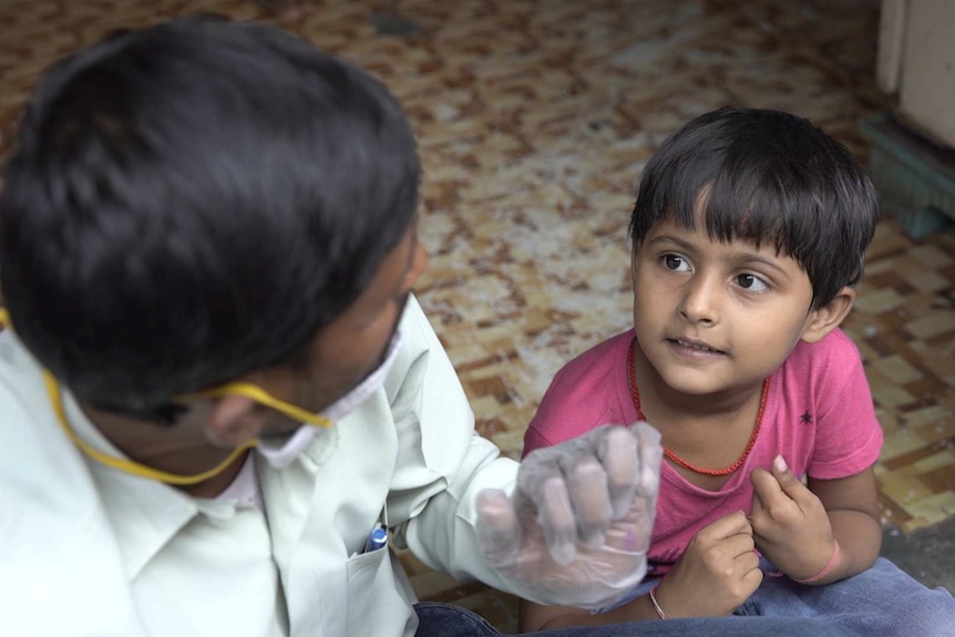 Sanjiv and his daughter.