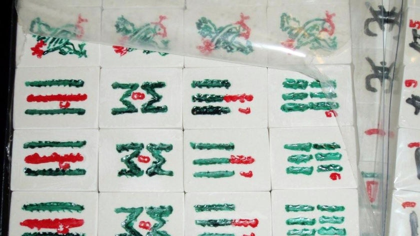 Mahjong tiles containing heroin seized by customs officials