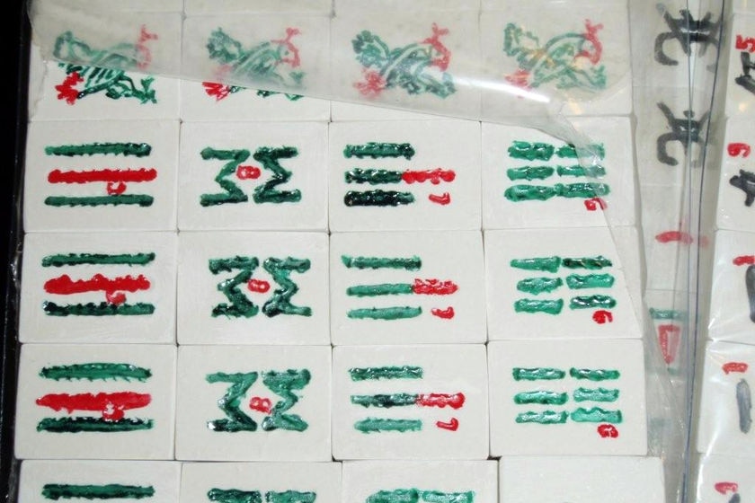Mahjong tiles containing heroin seized by customs officials