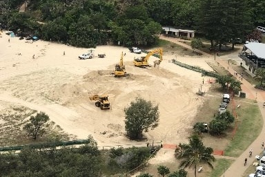 Aerial view of heavy machinery on Greenmount Beach