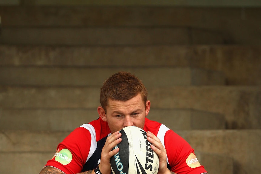 Todd Carney looks on during a Sydney Roosters training session in March 2011.