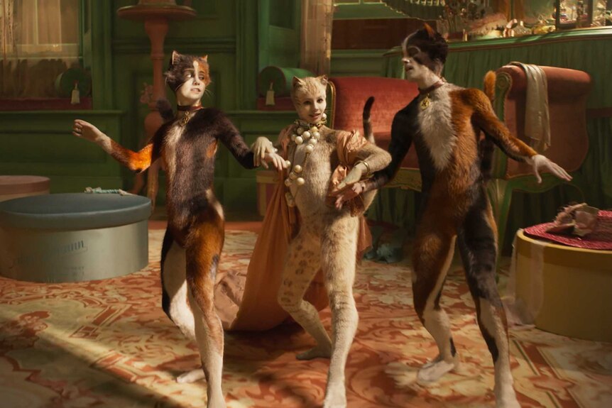 Three bizarre cat-human figures dancing in a lavish room