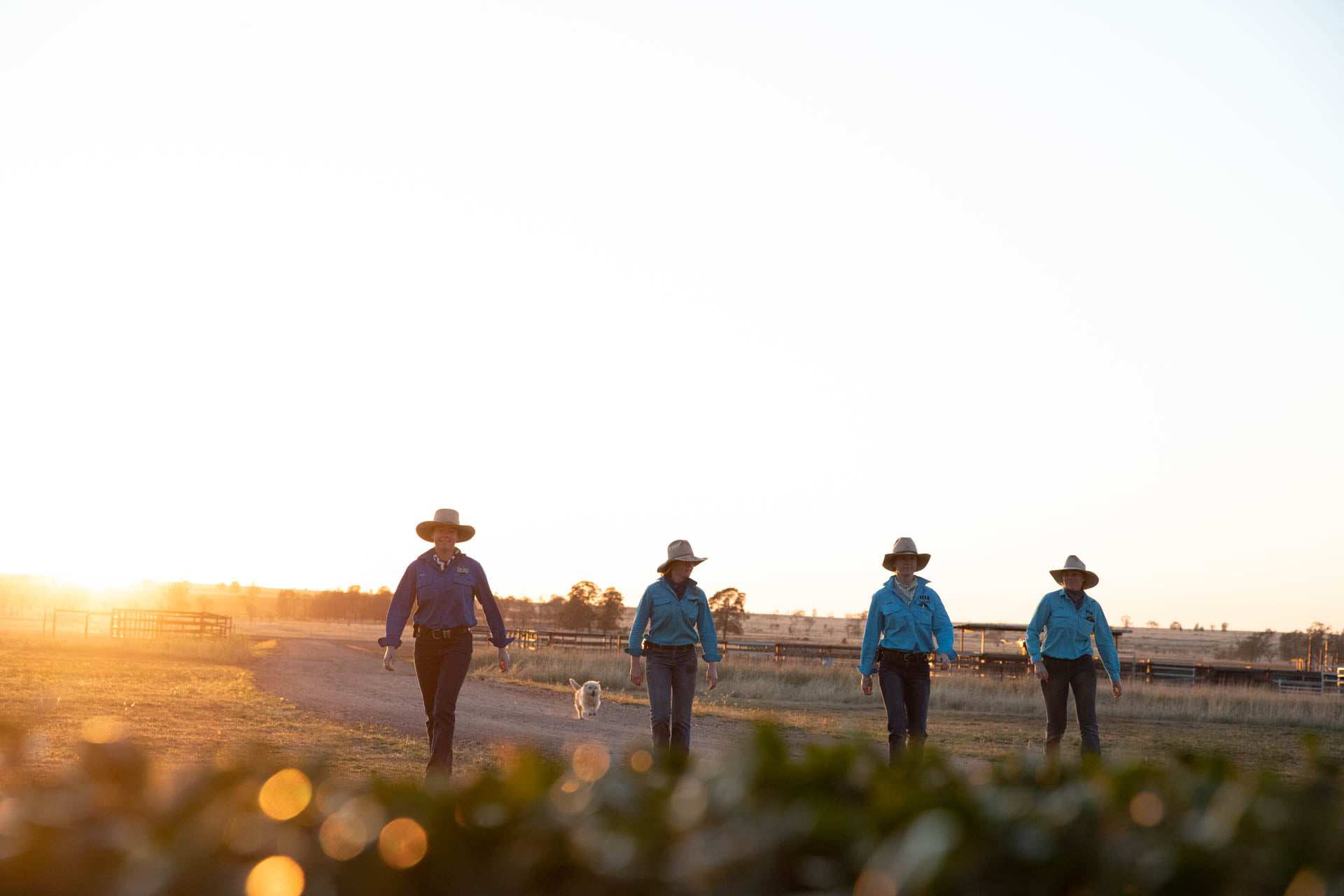 The Penfold daughters Jemima, Matilda, Bonnie and Molly walking in a yard