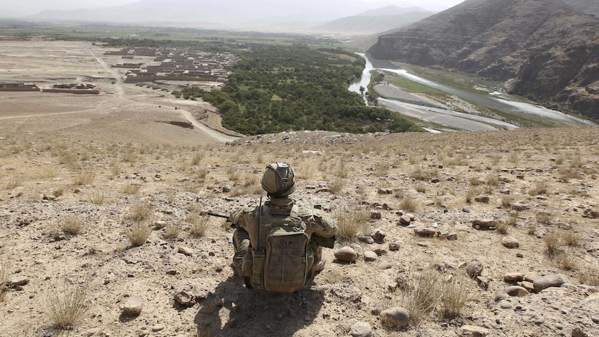 An Australian soldier takes time for a rest