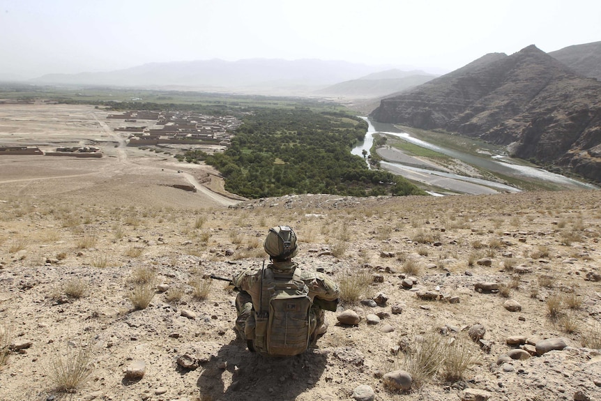 An Australian soldier takes time for a rest