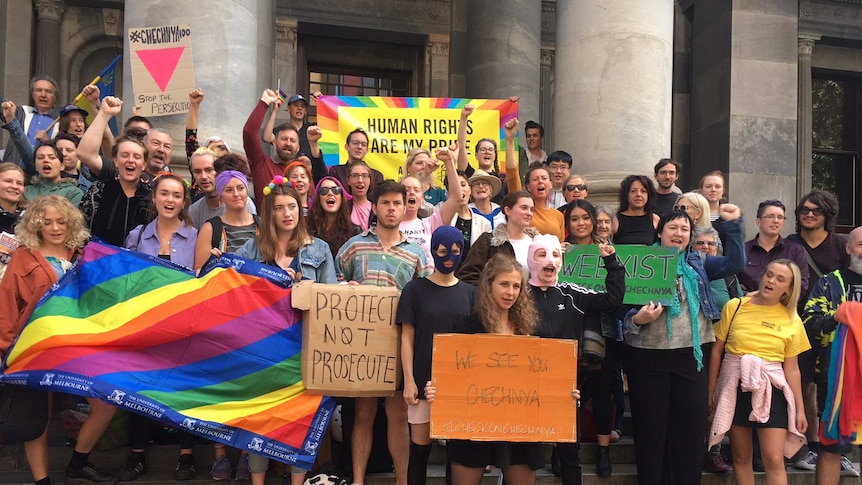 Supporters of LGBT rights in Chechnya on the steps of SA Parliament.