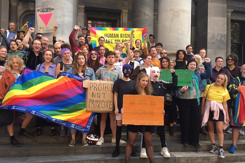 Supporters of LGBT rights in Chechnya on the steps of SA Parliament.